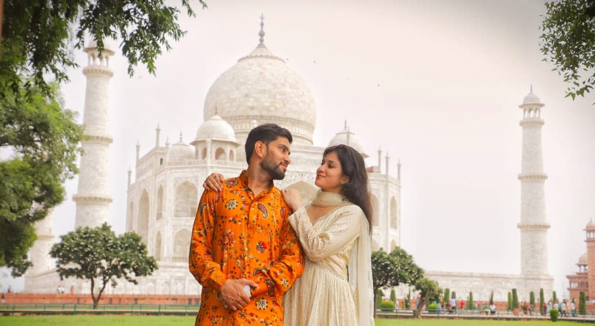 The great gateway of the Taj Mahal complex with the mausoleum framed in its arch